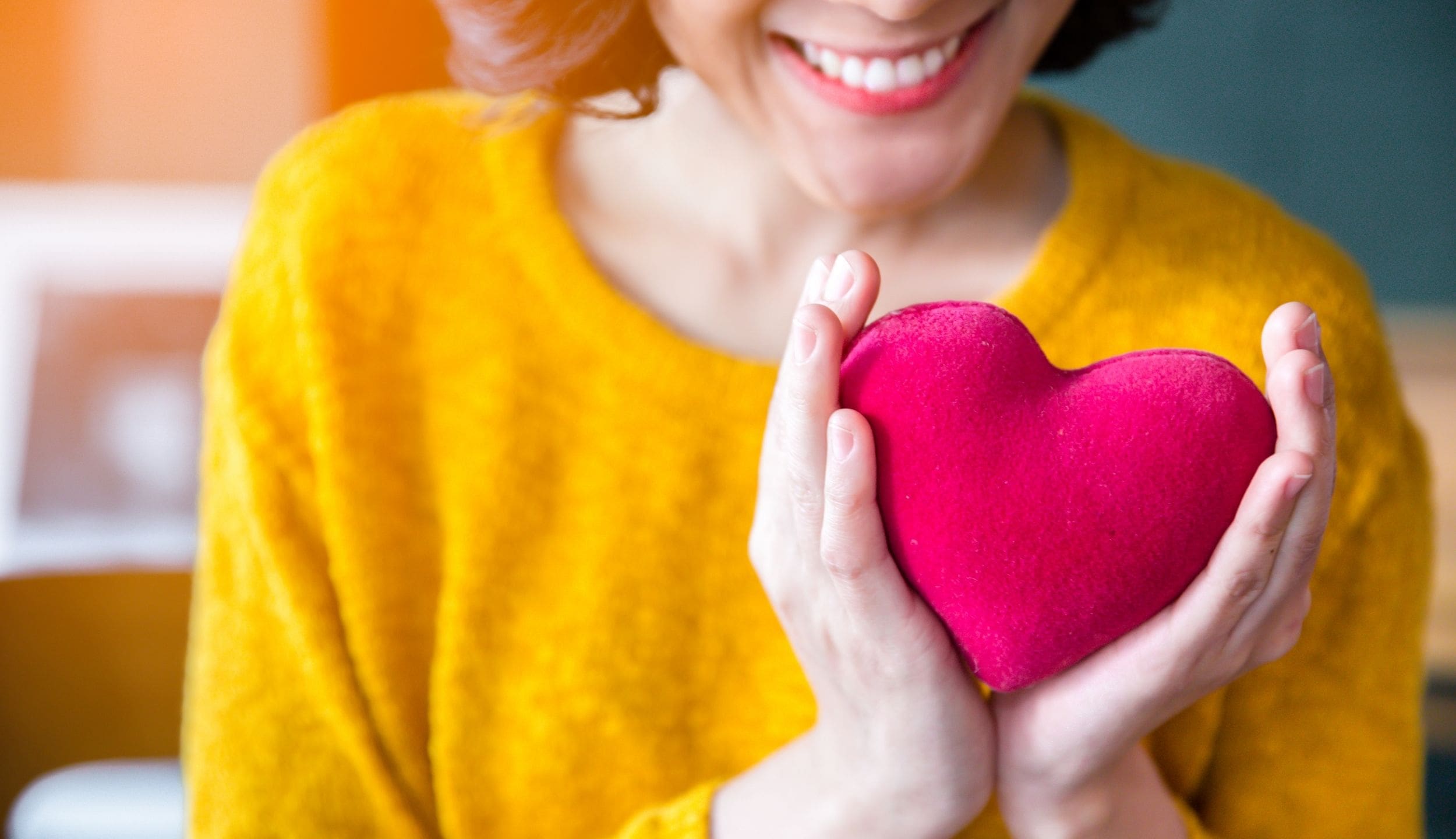 woman-holdinh-red-heart-for-heart-health