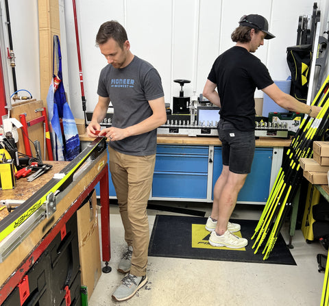 Scraping and picking through Fischer classic skis