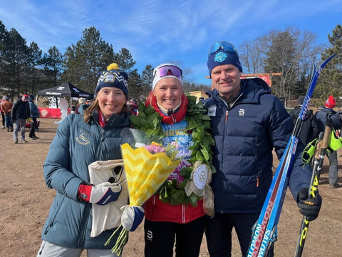 Hannah Rudd with her parents after the race