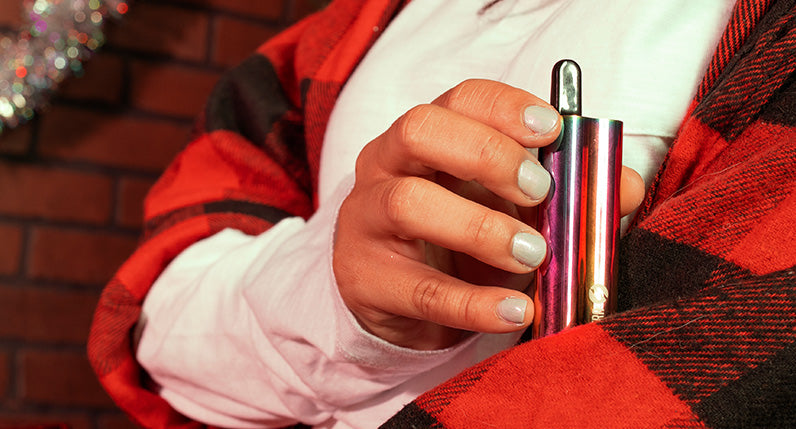 woman in red sweater holding the full color Sutra Auto