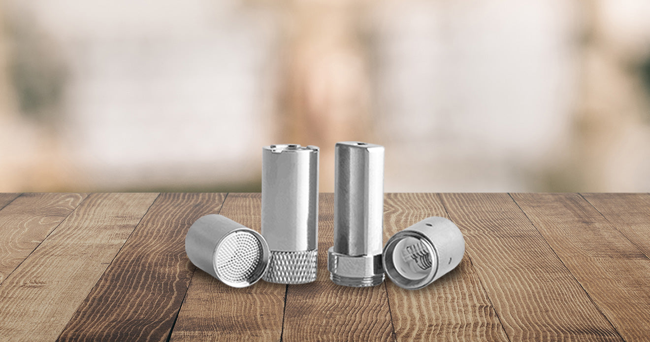 Atomizers on a wooden background