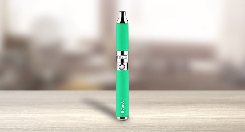 Yocan Evolve Concentrate Vaporizer standing on table inside house