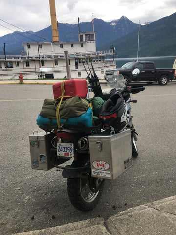 ate's bike (Gertie) loaded up with our prototype for testing in the field.Kate Gentles with her adventure bike ready to test a Bear Sentry portable electric fence in the field. We were taking a break in historic Kaslo, BC