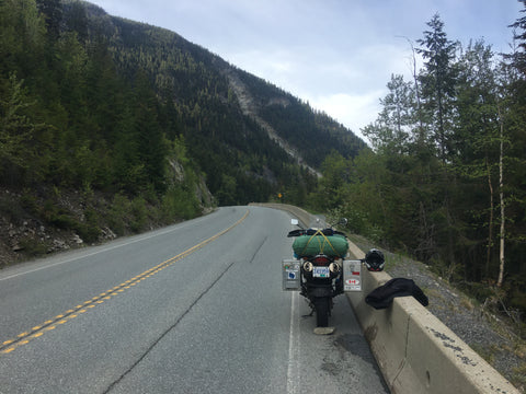 Kate Gentles’ motorcycle broken down in remote bear country, but safe with her Bear Sentry electric fence where she had to camp off the road.