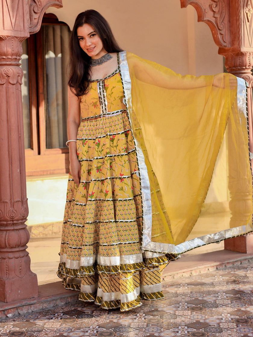 Divena Yellow Cotton Sleeves less anarkali Skirt Set With Dupatta