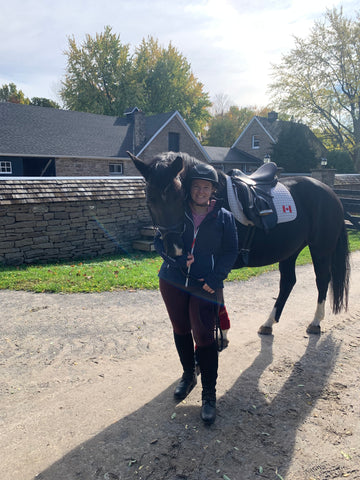 Adrienne Schmitke and her young dressage mare