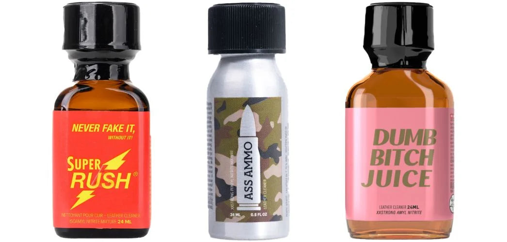 Three bottles of Amyl Poppers. From left to right, Super Rush Poppers, Ass Ammo and Dumb Bitch Juiice.