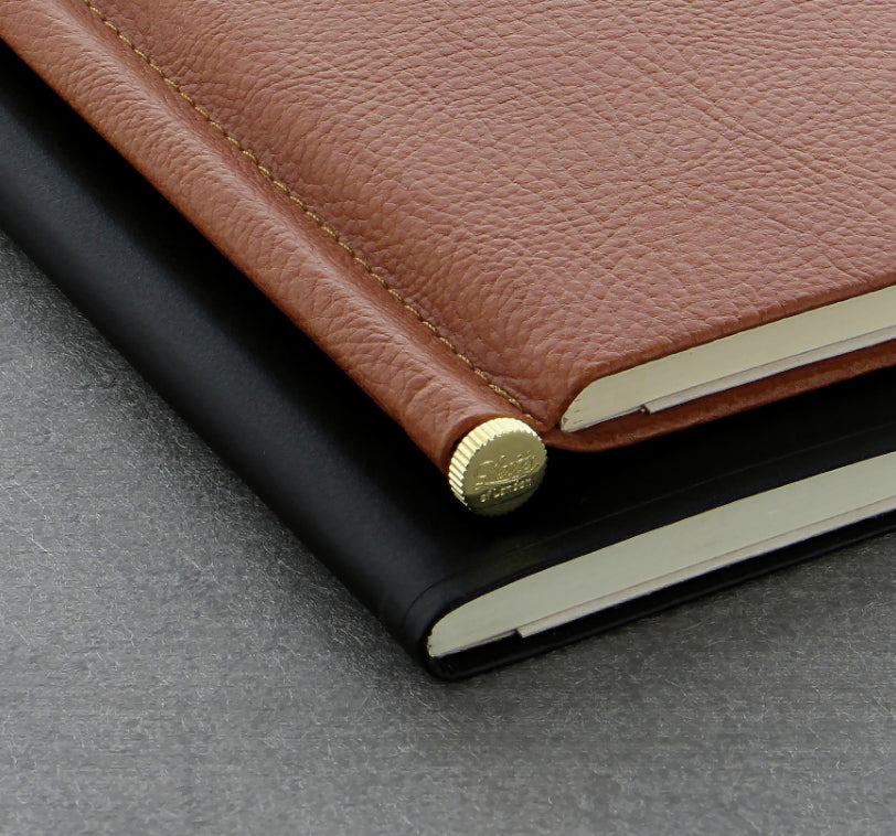 Sewn bound construction. Integrated pen with our Origins and Legacy Collections