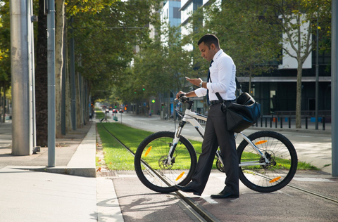 Person commuting to work using a cycle