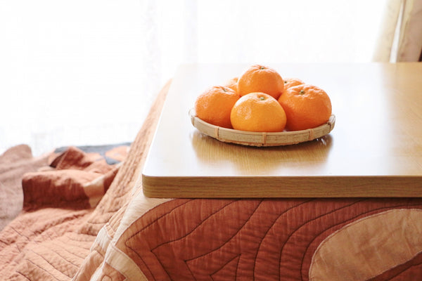 Mikan on a kotatsu