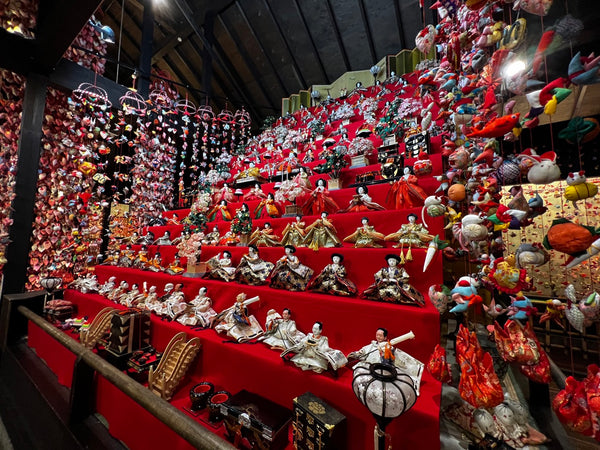 A massive display of hina dolls on a multi-tiered hinazakari in Izu Inatori