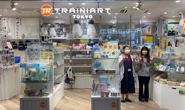 Trainiart staff waving hello to customers