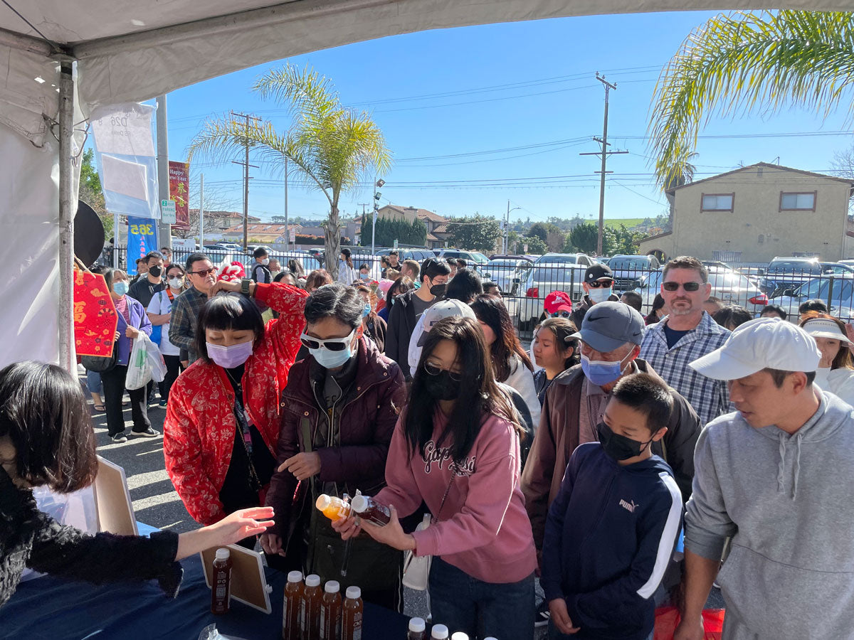 Crowds and lines at the 2023 Monterey Park Lunar New Year Festival FS Drinks booth.