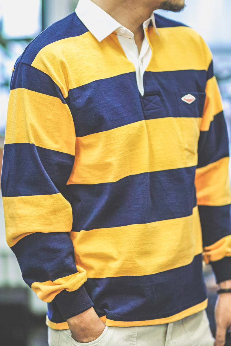 blue and yellow rugby jersey