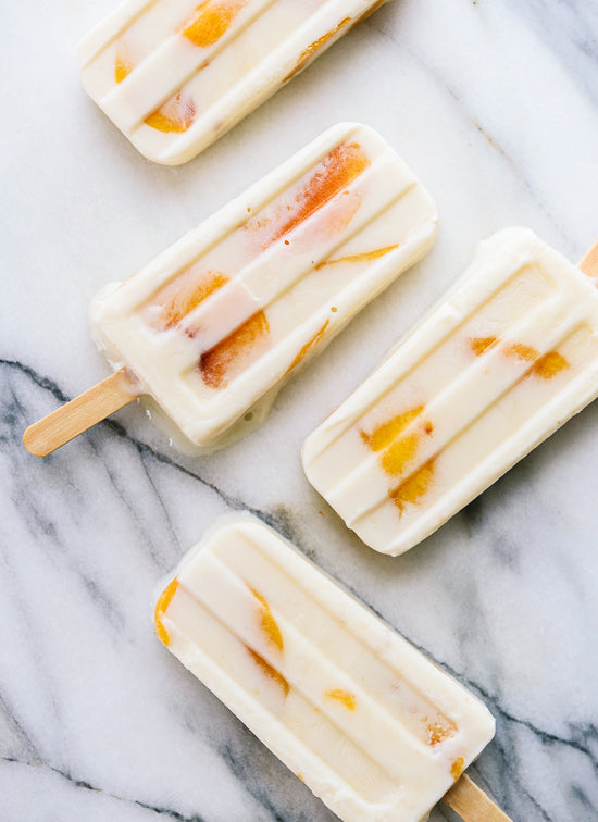 Creamy Peach + Honey Popsicles from the Cookie + Kate blog