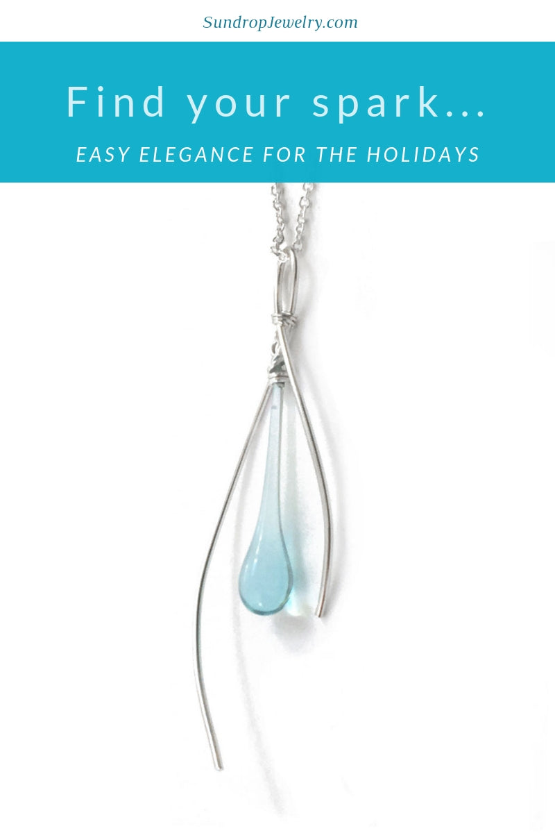 Easy holiday elegance with this sun-melted glass and graceful silver pendant necklace