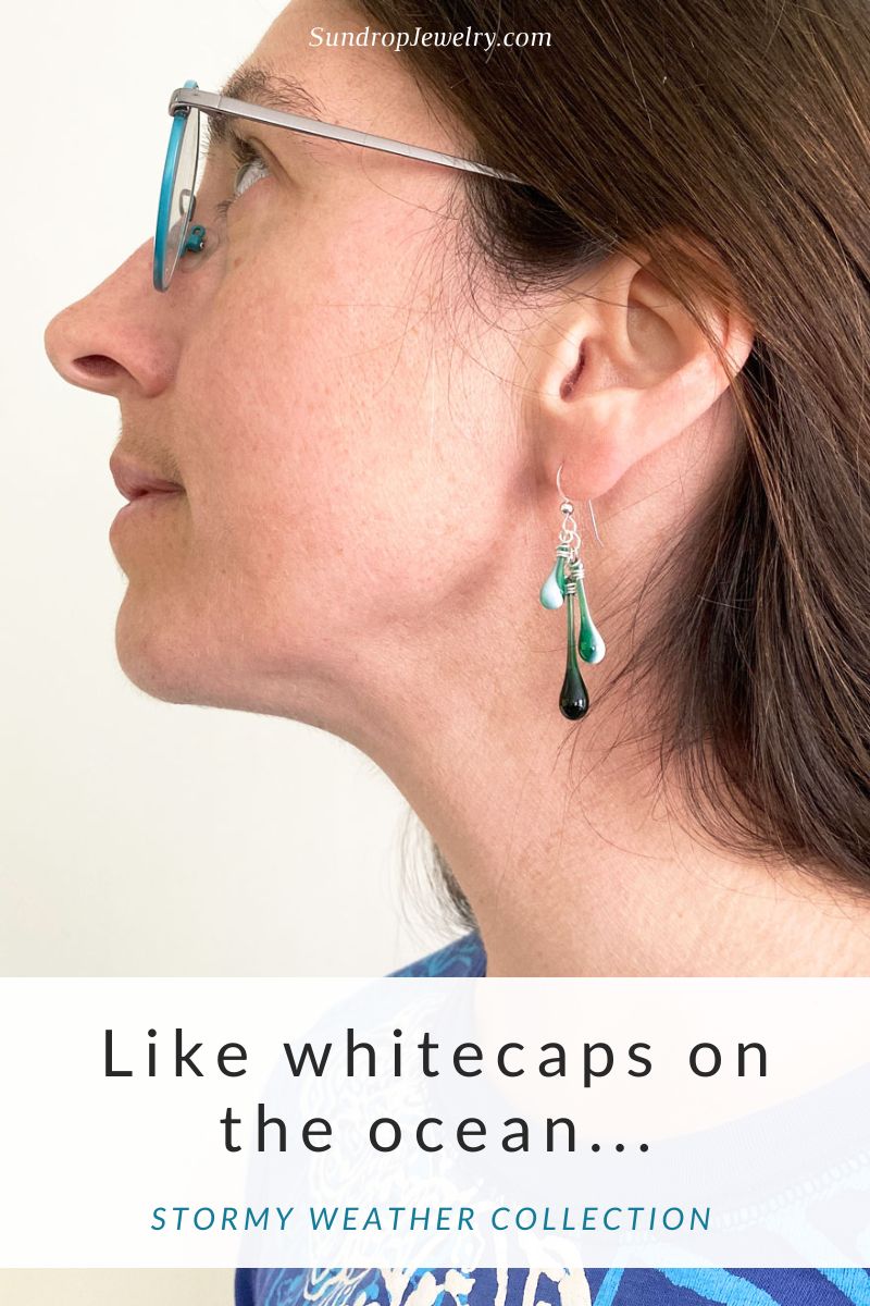 Blue-green glass earrings with a streak of white, handmade by Sundrop Jewelry, part of the new Stormy Weather collection