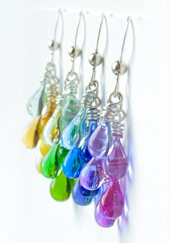Gorgeous gradients of sun-melted glass earrings - pinks, purples, blues, greens, and yellows by Sundrop Jewelry