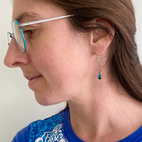 Stormy blues and blacks contrast with the simplicity of form in these elegant glass teardrop earrings