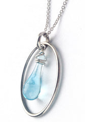 Pale blue cameo pendant made from Bombay Sapphire Gin bottles by Sundrop Jewelry