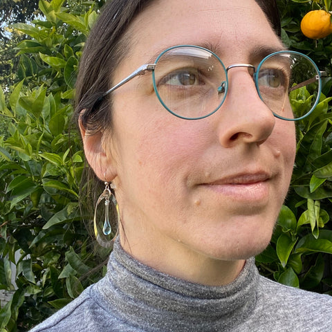 Oval Ribbon Earrings with a pale blue glass teardrop made from Bombay Sapphire Gin bottles