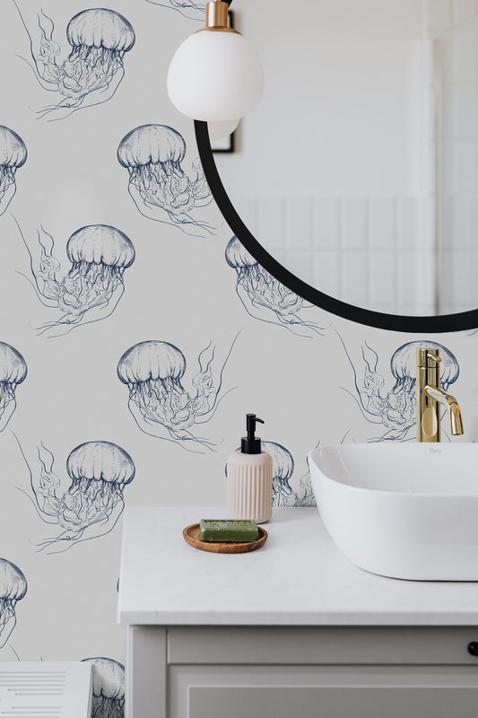 Nothing says coastal like a fun blowfish wallpaper 🤍🐟 Such a fun pattern  mixed with this dark navy subway tile. ⠀⠀⠀⠀⠀⠀⠀⠀⠀ #bathroom…