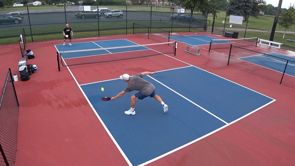 Image of men playing pickleball. | Pickleball Superstore