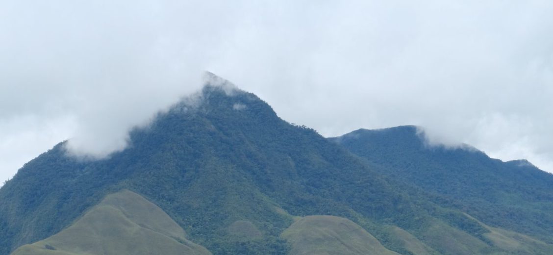WideFormat mountain peaks and clouds in Cajamarca, Peru