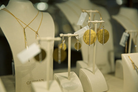 Photo of necklaces and earrings from Gurhan display case