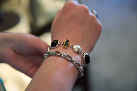 Photo of wrist with two bracelets