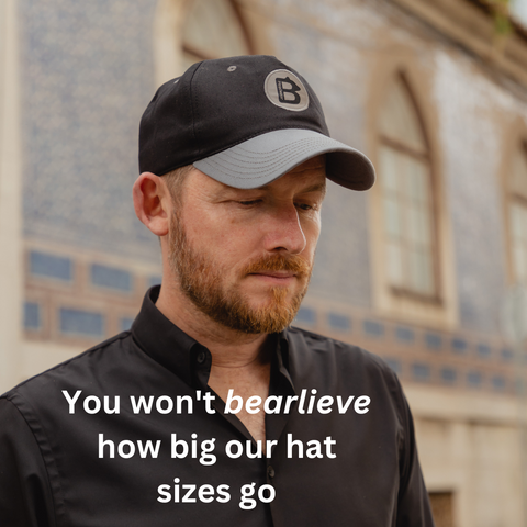 A man wearing a big baseball hat