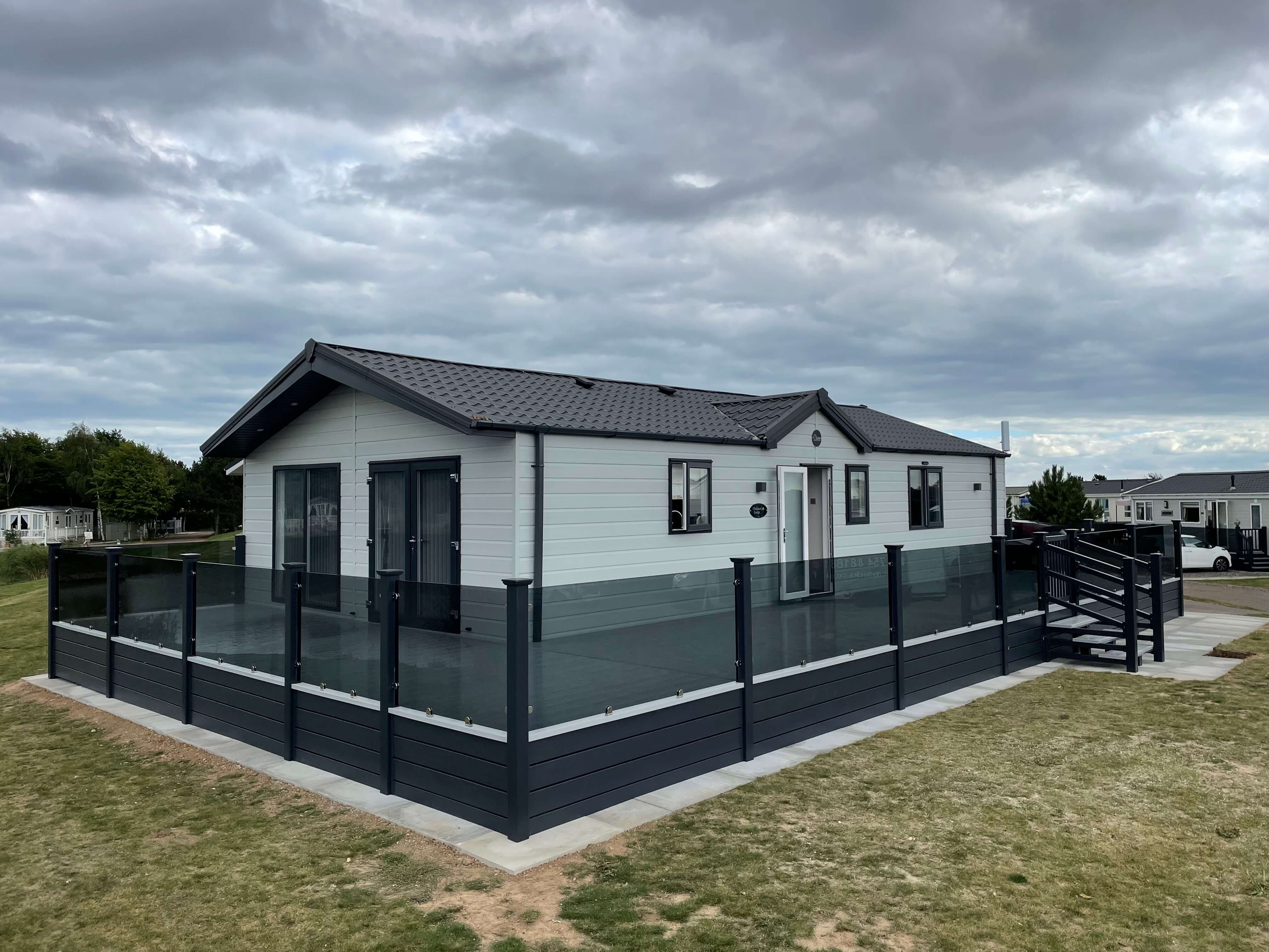 Grey glass balustrade and decking 