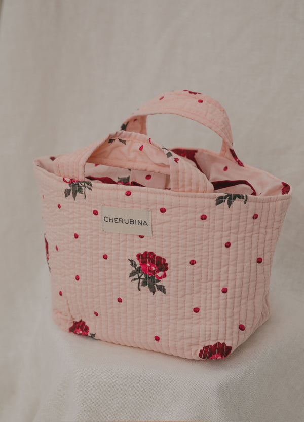 Neceser con asa estampado flores · Maeve