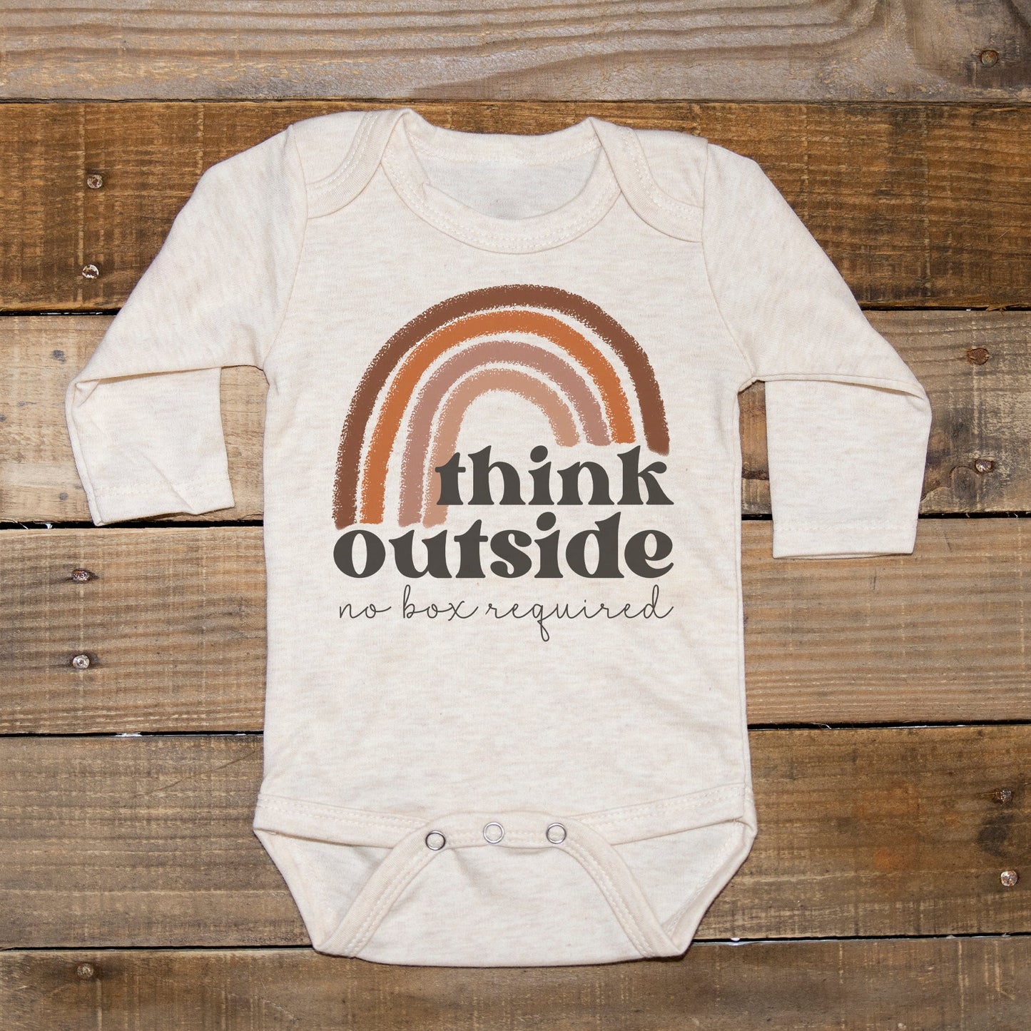 "Think outside no box required" Neutral Rainbow body suit