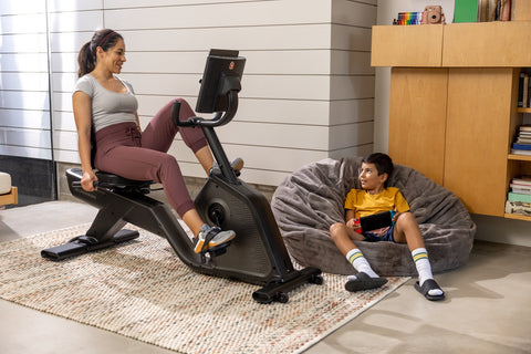 woman working out with baby near