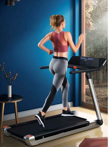 lady running on treadmill