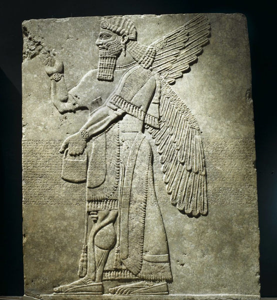 Assyrian Relief of Winged Man-Headed Figure