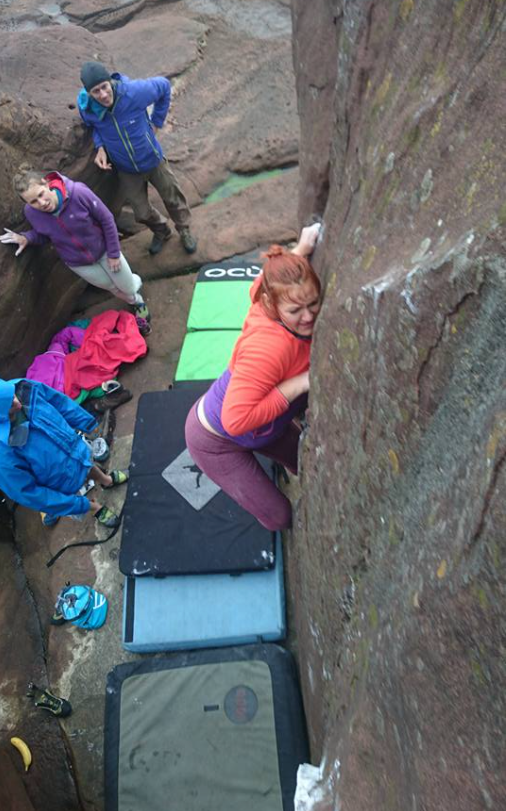 Naomi bouldering with the gang at St Bees