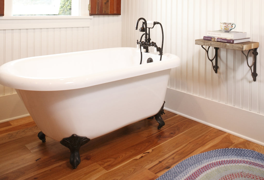 Clawfoot bathtub in a classic styled bathroom.