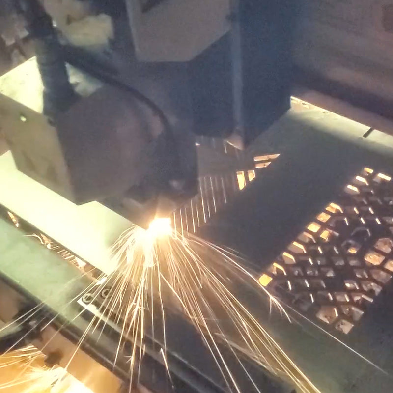 Laser cutting machine at work on registers.