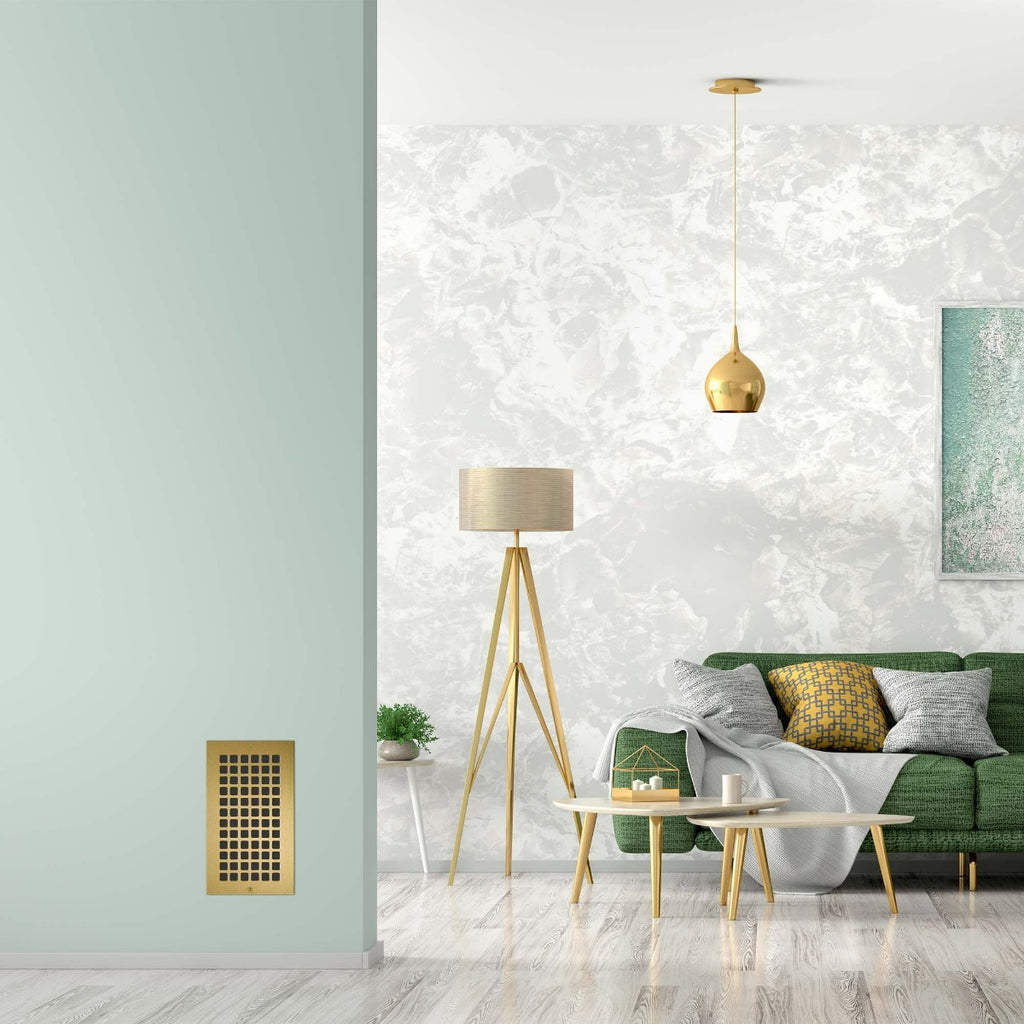 Gray and green living room with gold wall register.