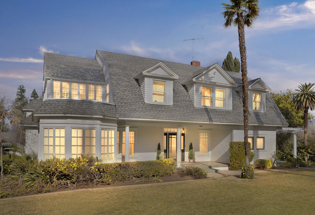 Exterior image of restored Dutch colonial home in California.