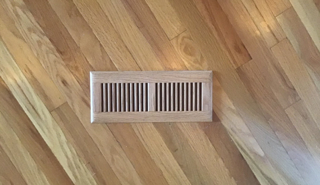 Wood register in a wood floor.