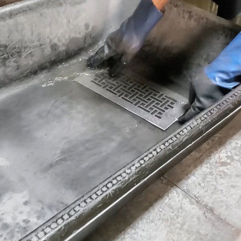 Person washing a register.