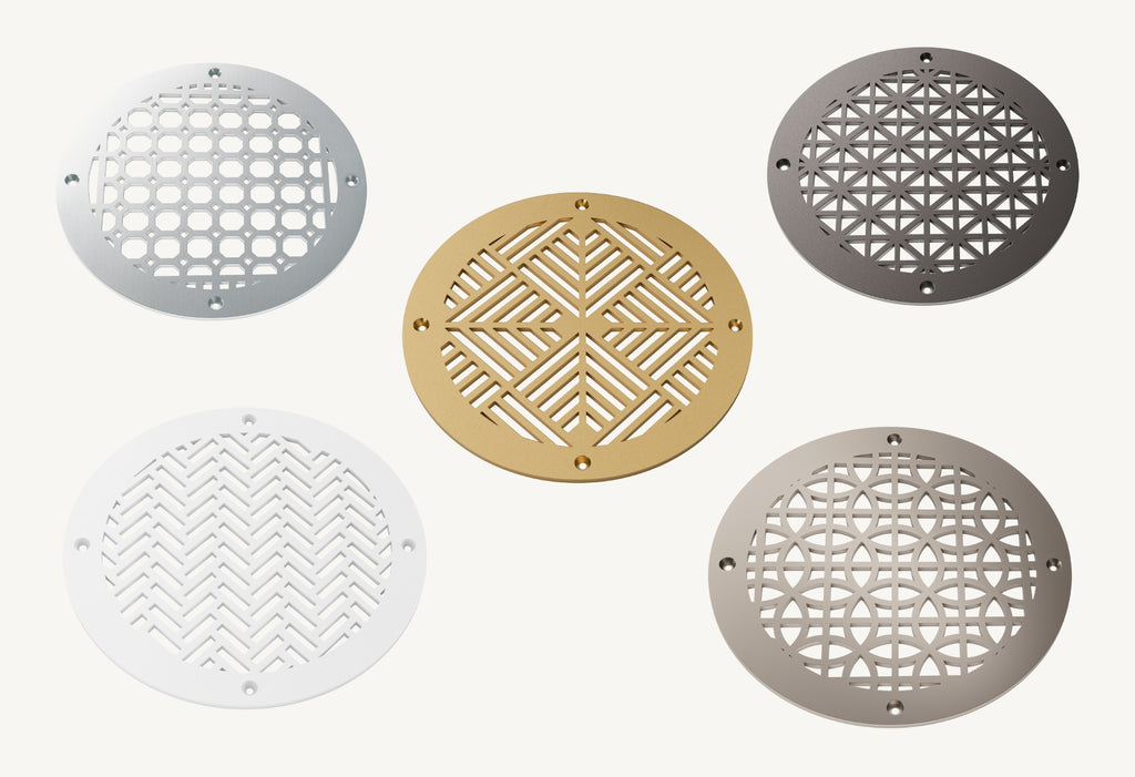 Round vent covers in various colors on a white background.