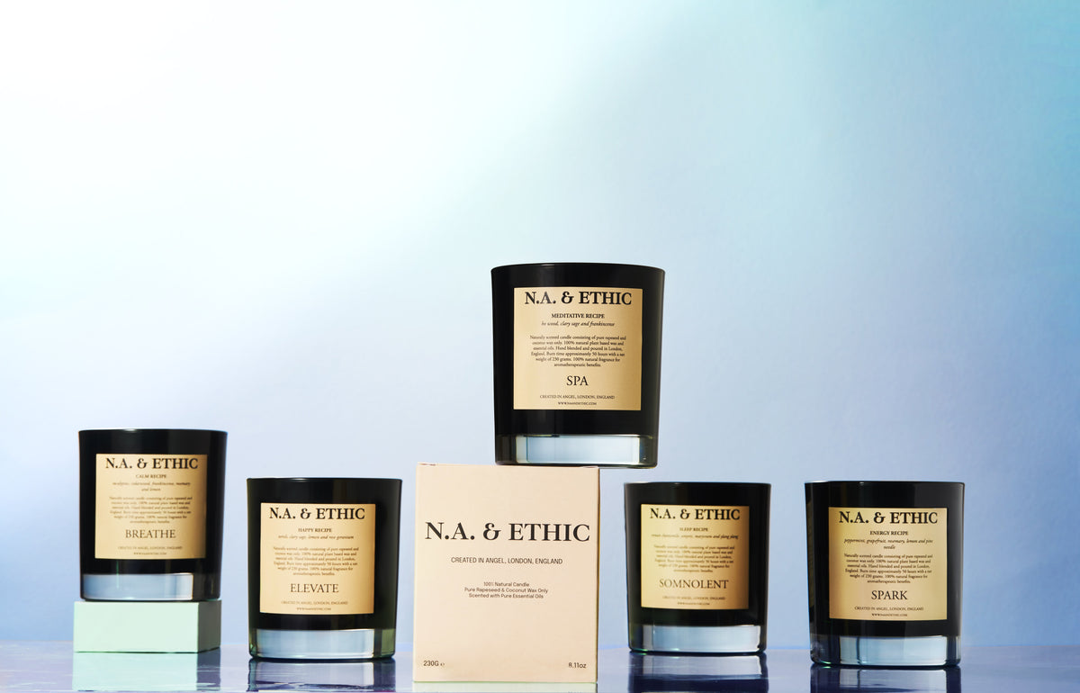 Collection of luxury essential oil candles with aromatherapy benefits