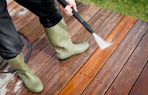 cleaning deck with a garden hose