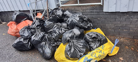 a pile of bags of litter collected at the Pick N chips event organised by the real food cafe