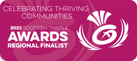 Visit Scotland badge of recognition for finalists in the Regional Thistle Award 2023 in the 'Celebrating Thriving Communities' category