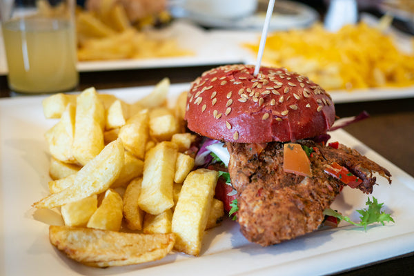 Tandoori chicken burger in red seeded beetroot bun, the real food cafe Tyndrum